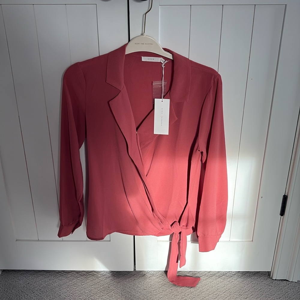 Lush mauve colored side tie blouse
